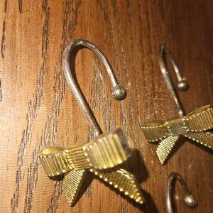 Gold Kate spade shower curtain hooks - used